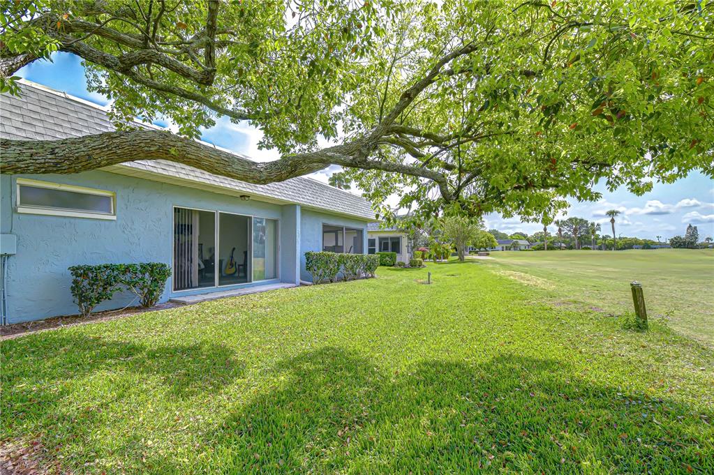 3439 Teeside Drive New Port Richey, FL 34655 - Photo 58 of 85 a front view of a house with a garden