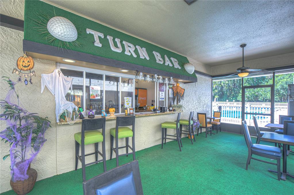 3439 Teeside Drive New Port Richey, FL 34655 - Photo 67 of 85 a view of a chairs and table in a patio