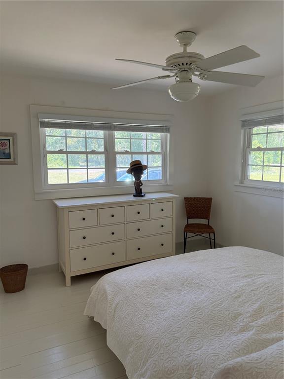 7390 South Mc Alpin Road McAlpin, FL 32062 - Photo 19 of 53 a bedroom with a bed and a dresser