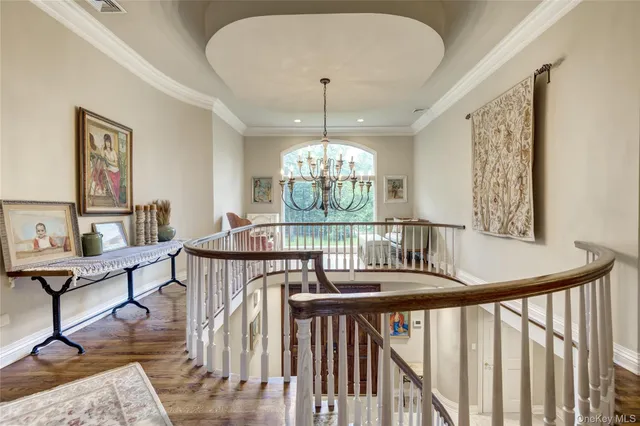 a view of a room with furniture window and wooden floor