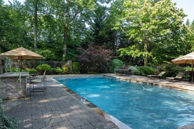 a view of a backyard with a sitting area