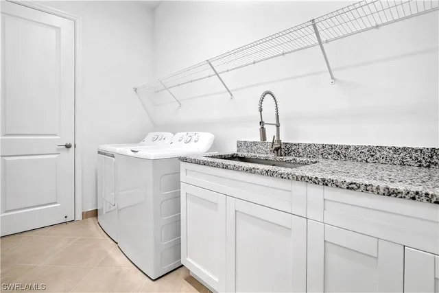 a bathroom with a sink and vanity