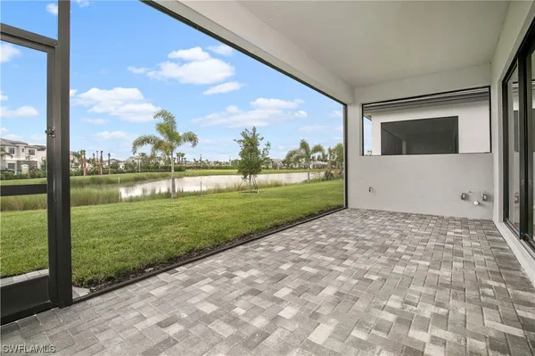 a view of a porch and a yard