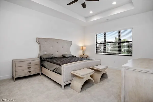 a living room with furniture and windows