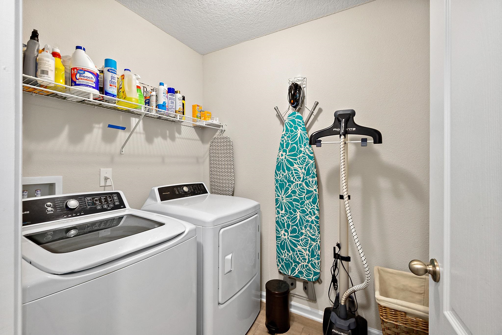 602 Crescent Key Drive St. Augustine, FL 32086 - Photo 13 of 47 a utility room with dryer and washer