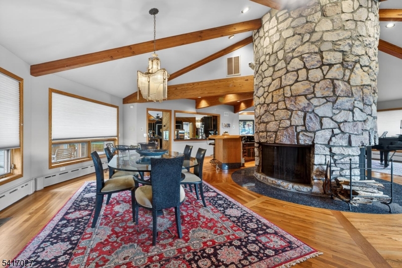 166 River Road Annandale, NJ 08801 - Photo 14 of 37 a dining room with a rug table and chairs
