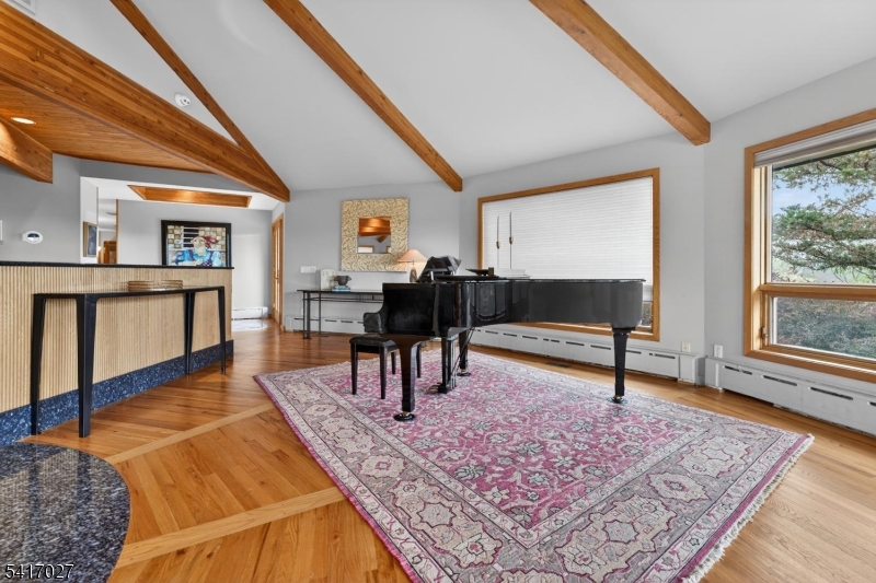 166 River Road Annandale, NJ 08801 - Photo 17 of 37 a living room with furniture rug and a table
