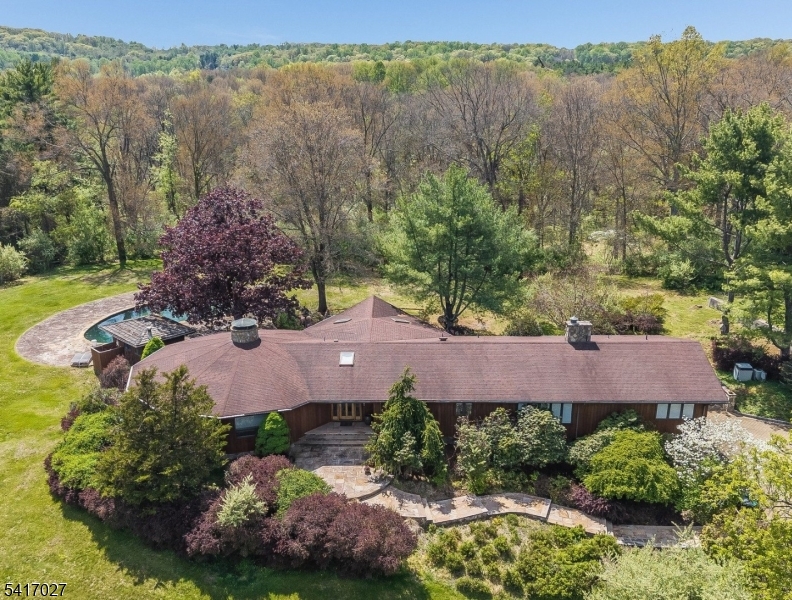 166 River Road Annandale, NJ 08801 - Photo 2 of 37 an aerial view of house with yard swimming pool and outdoor seating