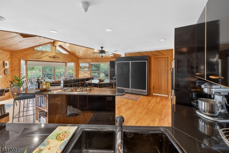 166 River Road Annandale, NJ 08801 - Photo 21 of 37 a kitchen with stainless steel appliances granite countertop a stove and a sink
