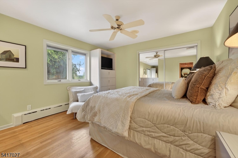 166 River Road Annandale, NJ 08801 - Photo 29 of 37 a bedroom with a bed and window