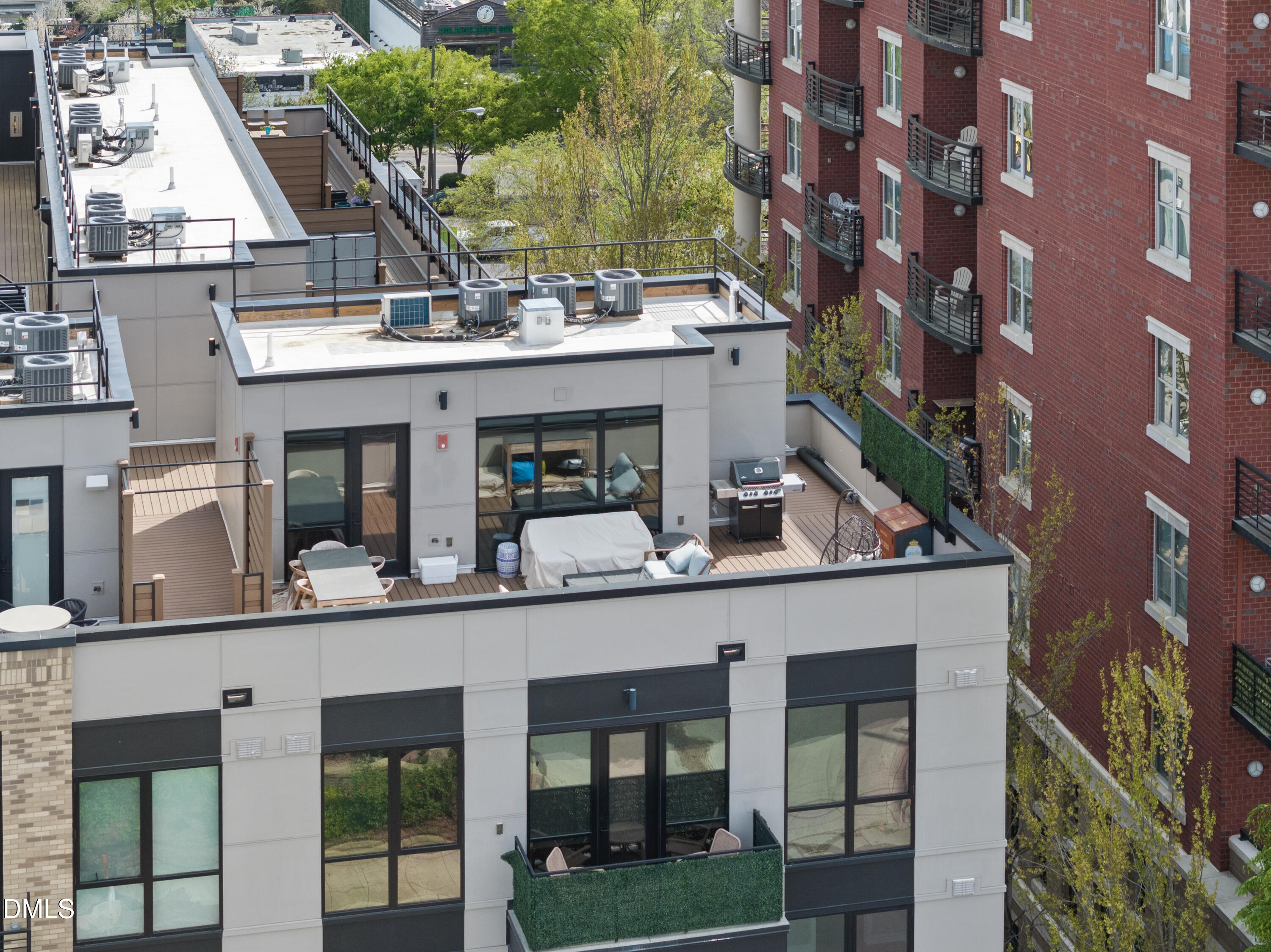 615 West Peace Street, Unit 207 Raleigh, NC 27605 - Photo 22 of 34 a view of a building with a tree