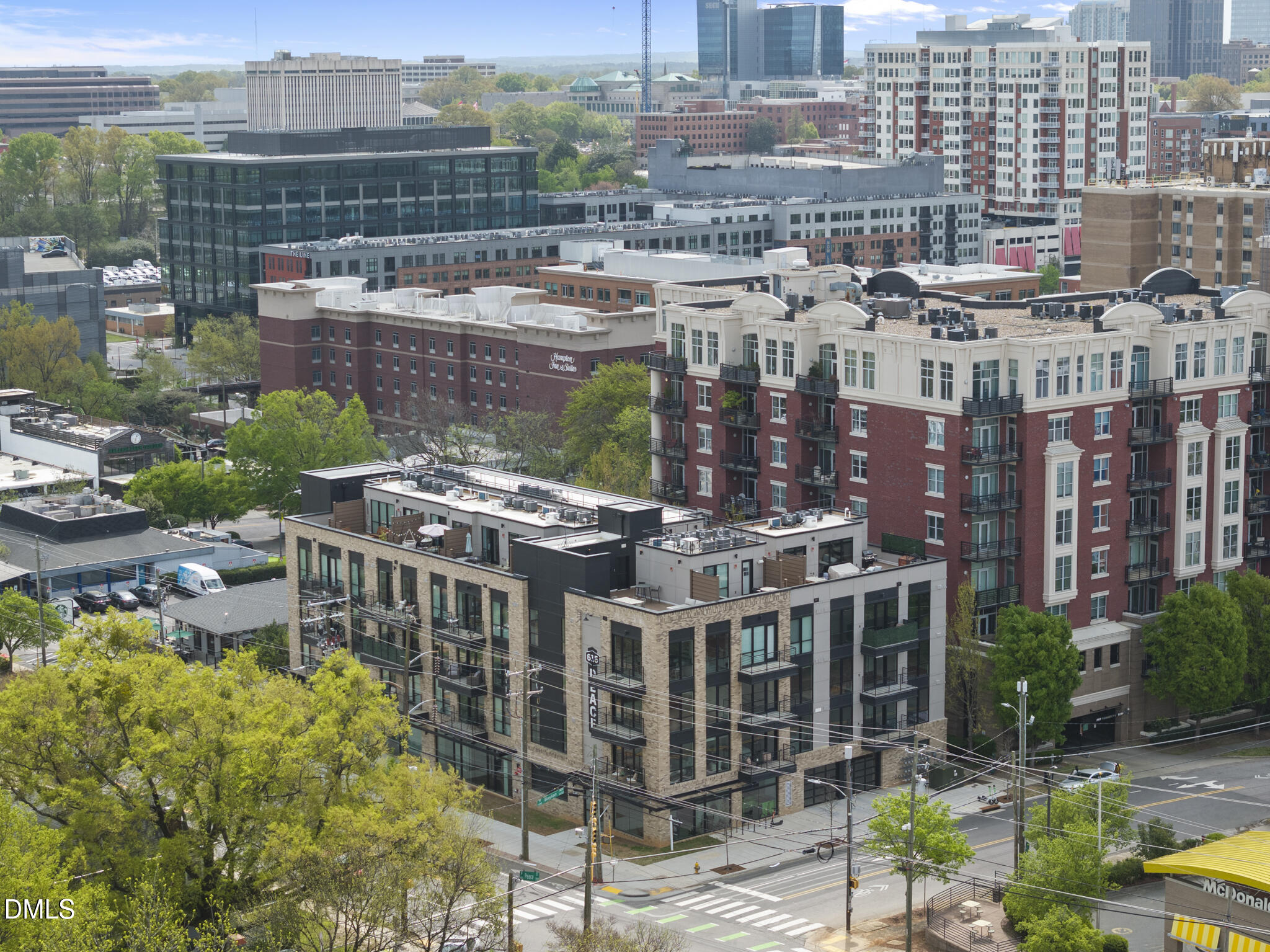 615 West Peace Street, Unit 207 Raleigh, NC 27605 - Photo 24 of 34 a view of a city that has tall buildings