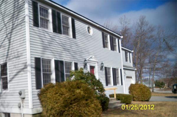 17 Kelshill Road Chelmsford, MA 01863 - Photo 3 of 7 a front view of a house with garden