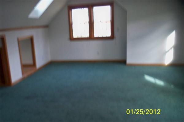 17 Kelshill Road Chelmsford, MA 01863 - Photo 7 of 7 an empty room with a window
