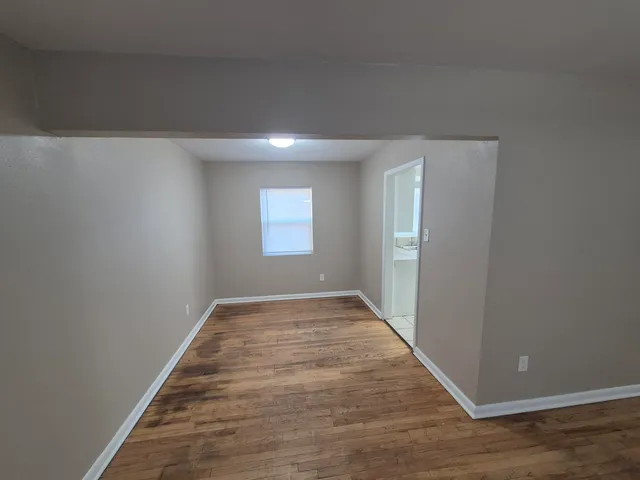 a view of an empty room and window