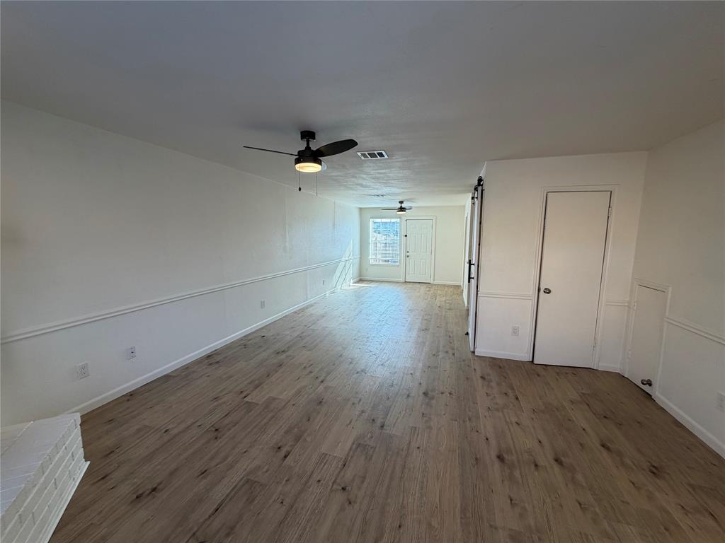 8 Trails Place, Unit B Wylie, TX 75098 - Photo 5 of 24 a view of a livingroom with wooden floor