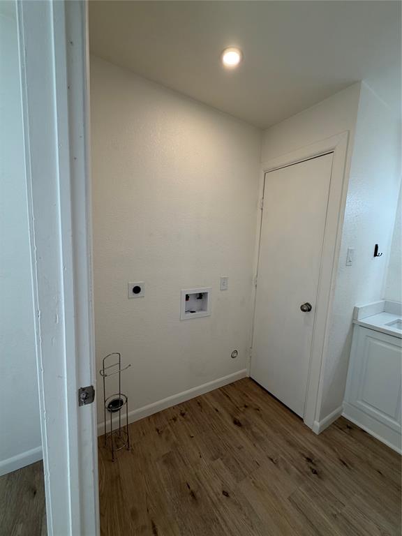 8 Trails Place, Unit B Wylie, TX 75098 - Photo 9 of 24 a view of an empty room with wooden floor and closet