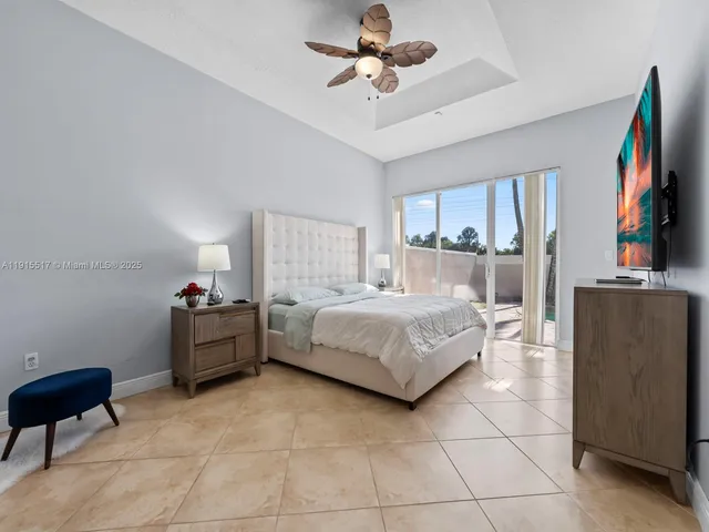a en suite bathroom with a sink vanity tub and shower