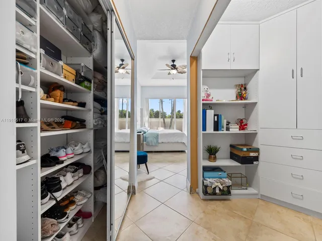 a living room with furniture toys and a window