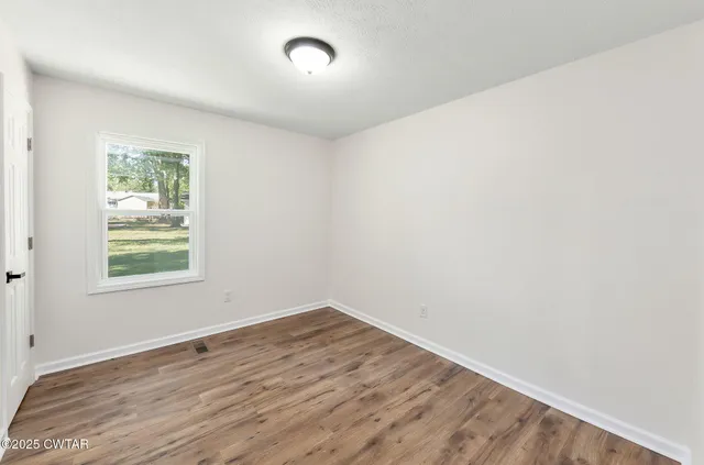 an empty room with a window