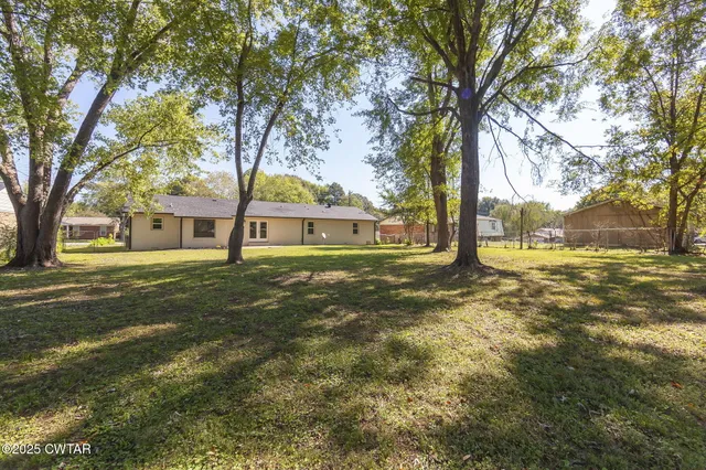 a house view with a garden space