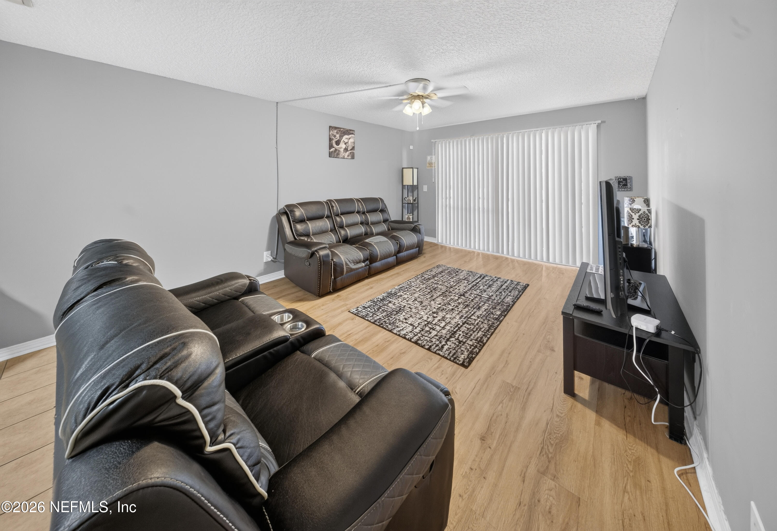 7346 El Barco Road, Unit 4 Jacksonville, FL 32216 - Photo 1 of 19 a bedroom with a bed and a couch