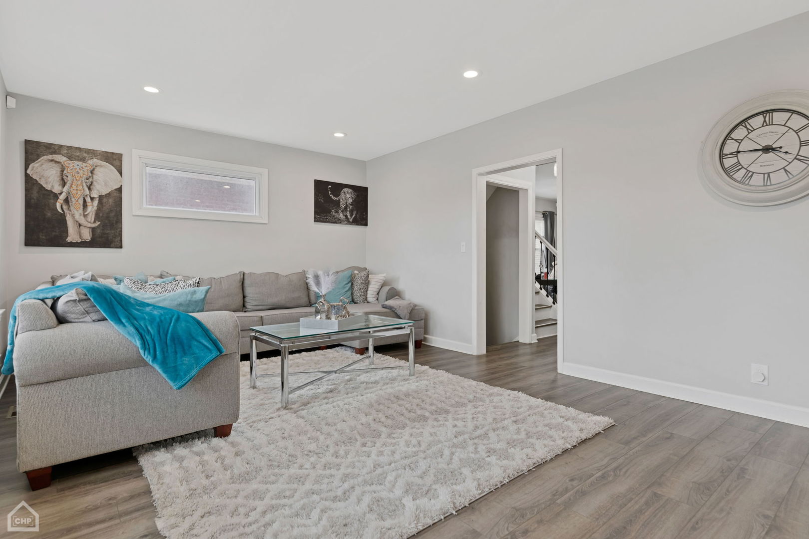 9320 South Racine Avenue Chicago, IL 60620 - Photo 4 of 25 a living room with furniture and a window