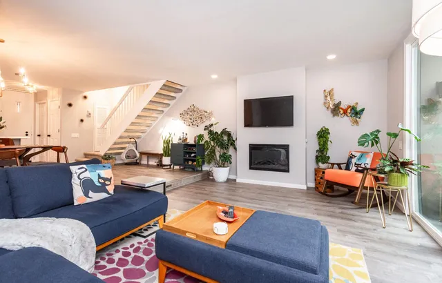 a view of a chairs and table in a backyard