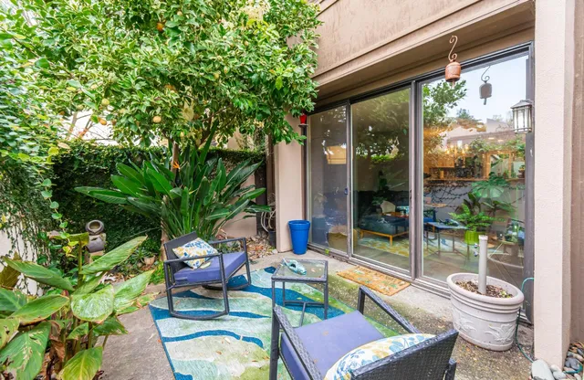 a view of a living room and a flat screen tv