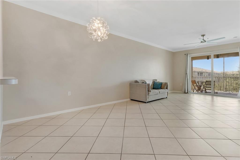 8570 Kingbird Loop, Unit 542 Estero, FL 33967 - Photo 11 of 43 a view of an empty room with a window