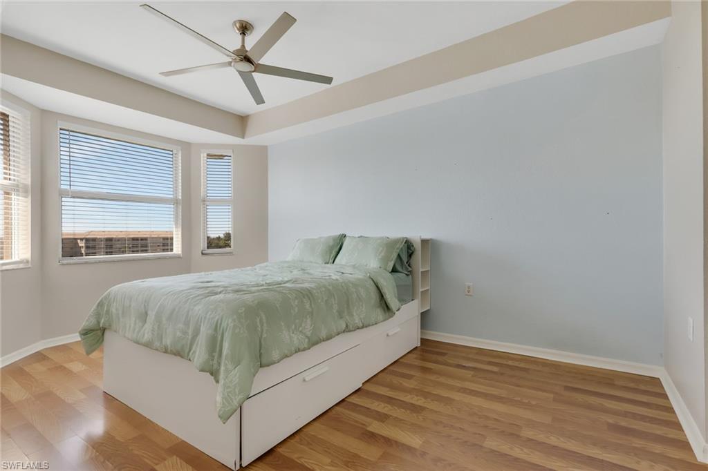 8570 Kingbird Loop, Unit 542 Estero, FL 33967 - Photo 18 of 43 a bedroom with a bed and window