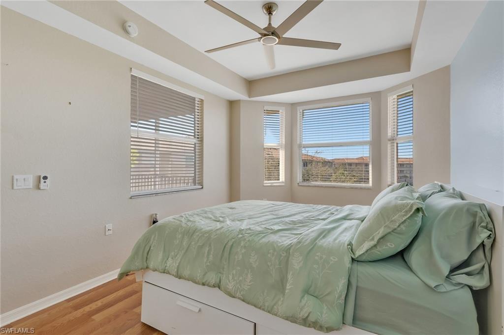 8570 Kingbird Loop, Unit 542 Estero, FL 33967 - Photo 19 of 43 a bedroom with a bed and window