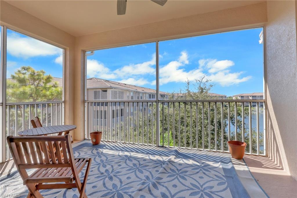 8570 Kingbird Loop, Unit 542 Estero, FL 33967 - Photo 2 of 43 a view of a room with balcony and furniture