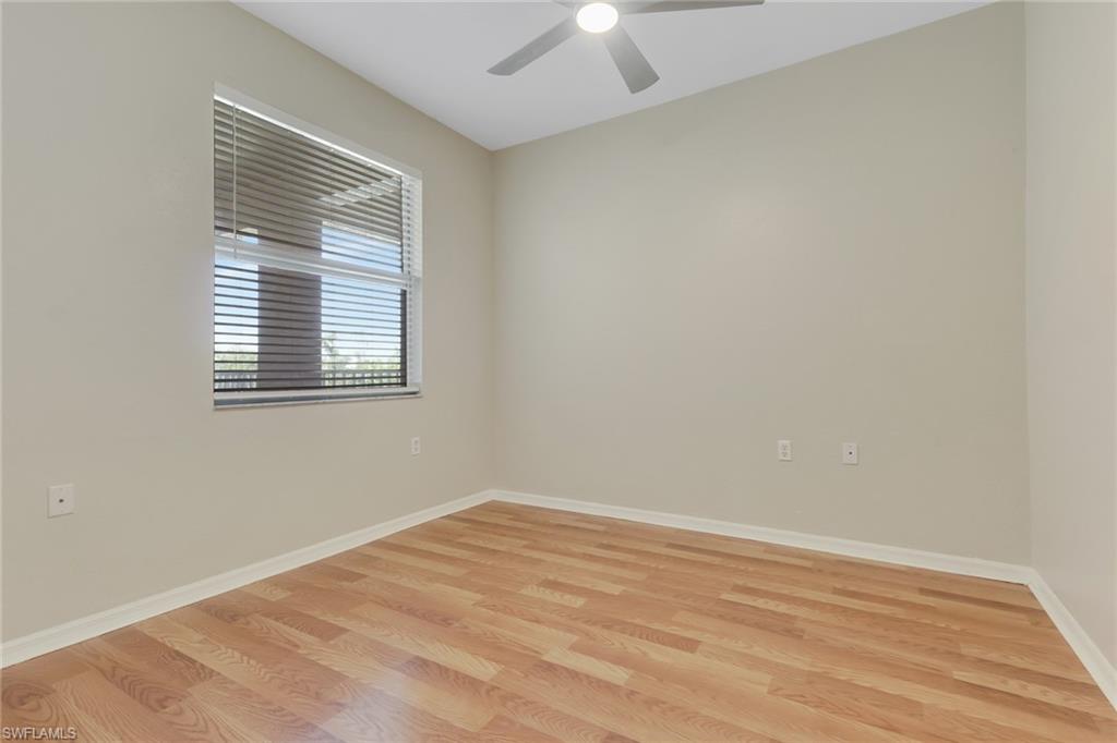 8570 Kingbird Loop, Unit 542 Estero, FL 33967 - Photo 25 of 43 an empty room with a window