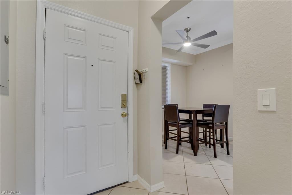8570 Kingbird Loop, Unit 542 Estero, FL 33967 - Photo 3 of 43 a view of a dining room with furniture