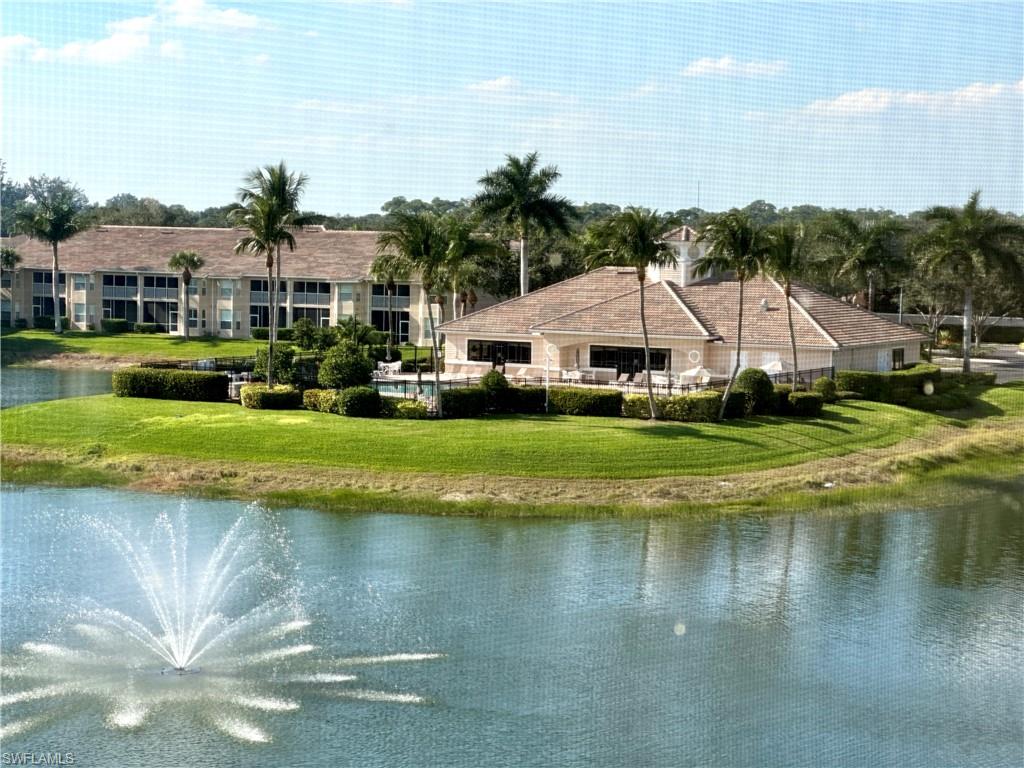 8570 Kingbird Loop, Unit 542 Estero, FL 33967 - Photo 34 of 43 a view of house with garden and lake view