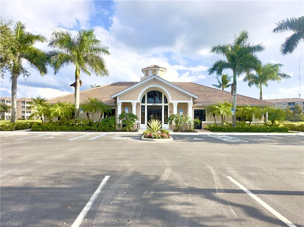 8570 Kingbird Loop, Unit 542 Estero, FL 33967 - Photo 36 of 43 a front view of a house with garden and porch