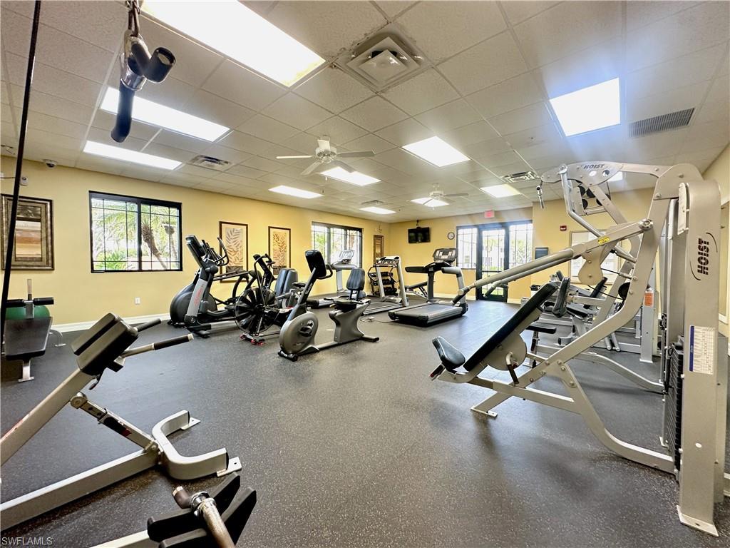 8570 Kingbird Loop, Unit 542 Estero, FL 33967 - Photo 42 of 43 a view of a room with gym equipment