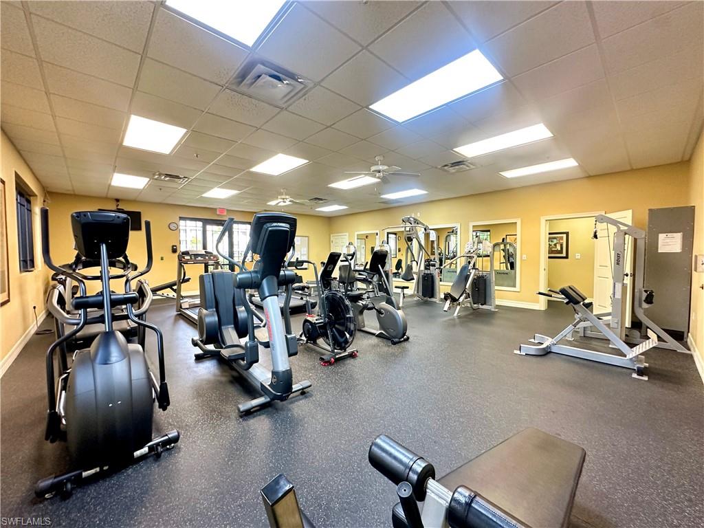8570 Kingbird Loop, Unit 542 Estero, FL 33967 - Photo 43 of 43 a view of a room with gym equipment