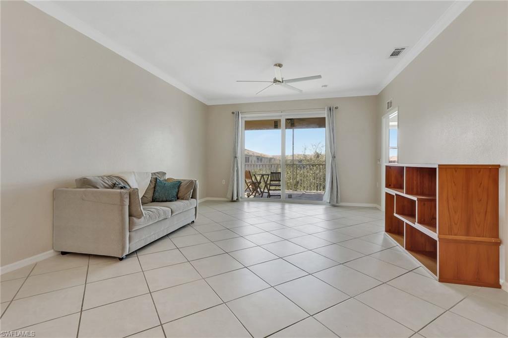 8570 Kingbird Loop, Unit 542 Estero, FL 33967 - Photo 10 of 43 a view of livingroom with furniture and window