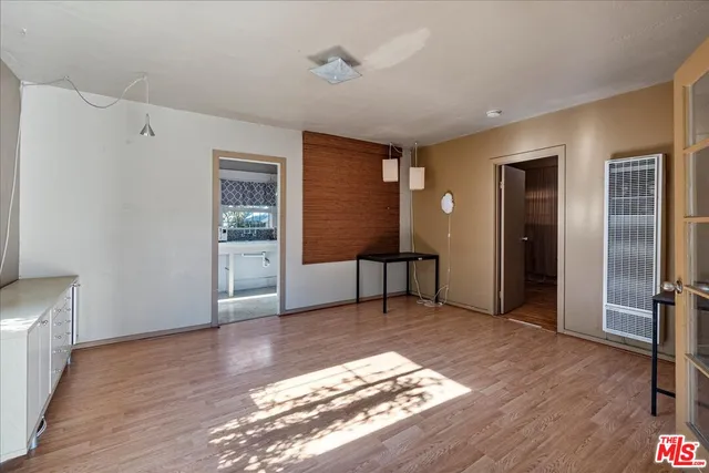a view of livingroom with hardwood floor and a ceiling fan