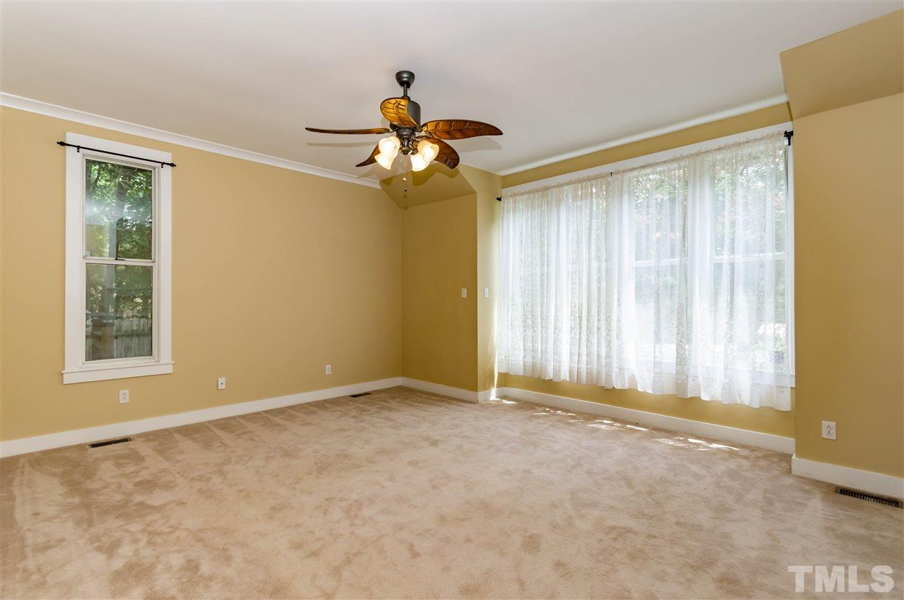 6038 Sentinel Drive Raleigh, NC 27609 - Photo 3 of 24 a view of an empty room with a window