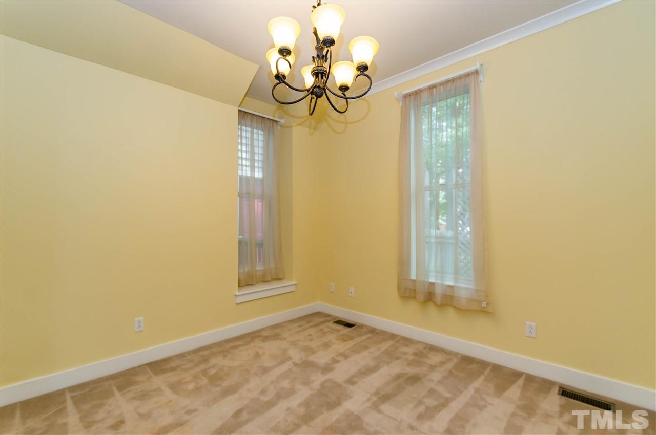 6038 Sentinel Drive Raleigh, NC 27609 - Photo 5 of 24 a view of empty room with window