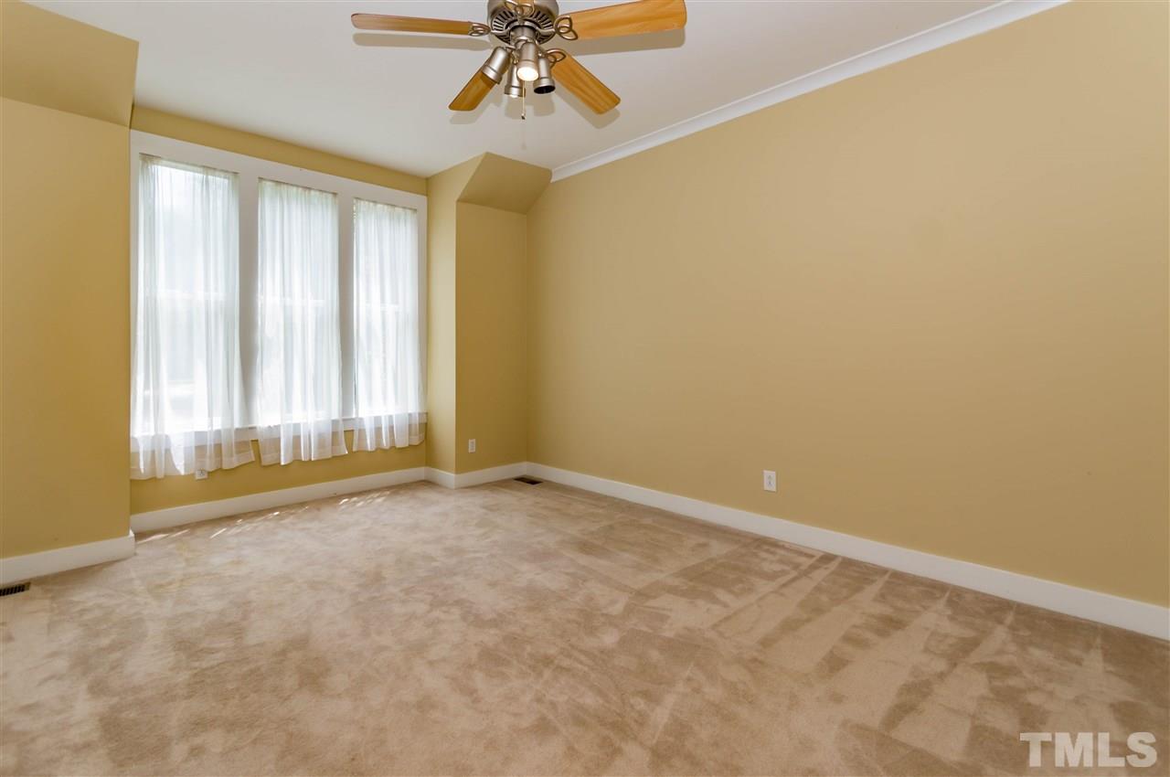 6038 Sentinel Drive Raleigh, NC 27609 - Photo 10 of 24 a view of an empty room with a window