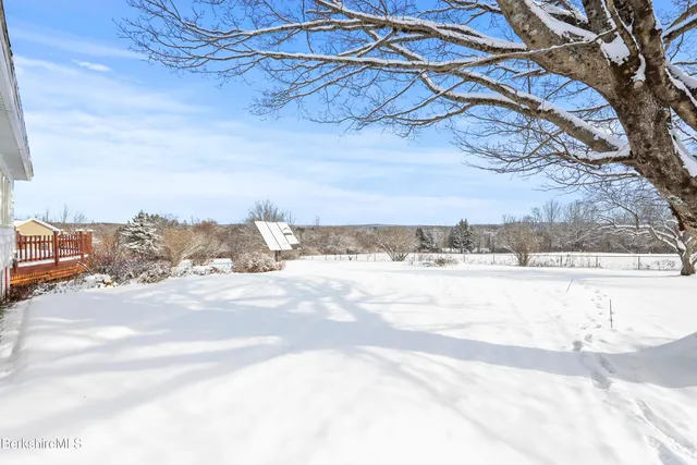 a view of a snow on the road