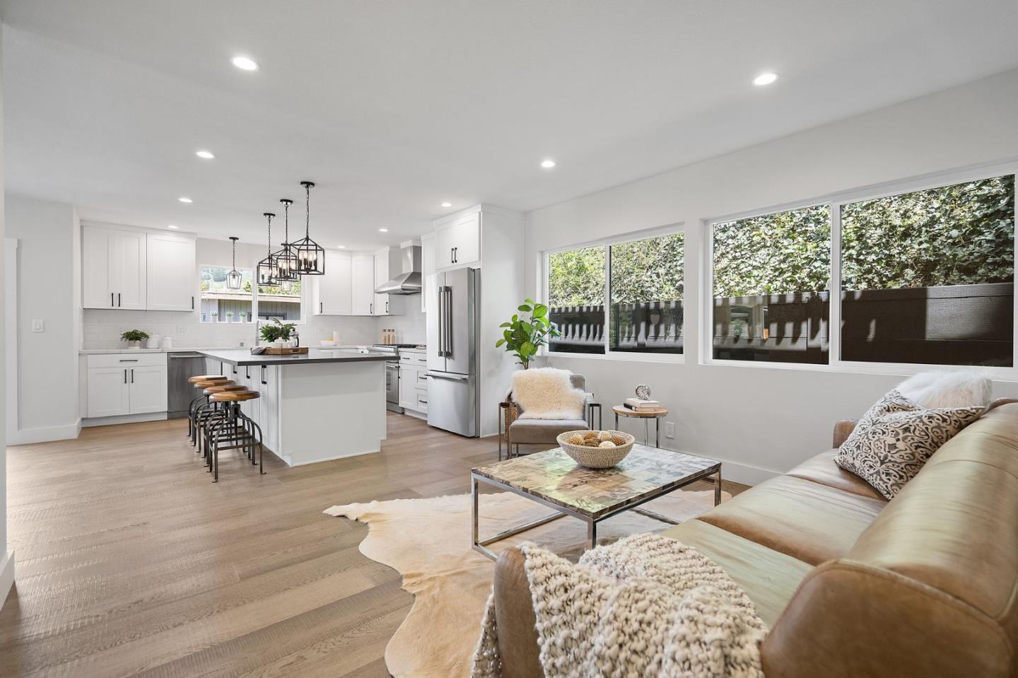 311 Keith Avenue Pacifica, CA 94044 - Photo 12 of 40 a living room with furniture and kitchen view