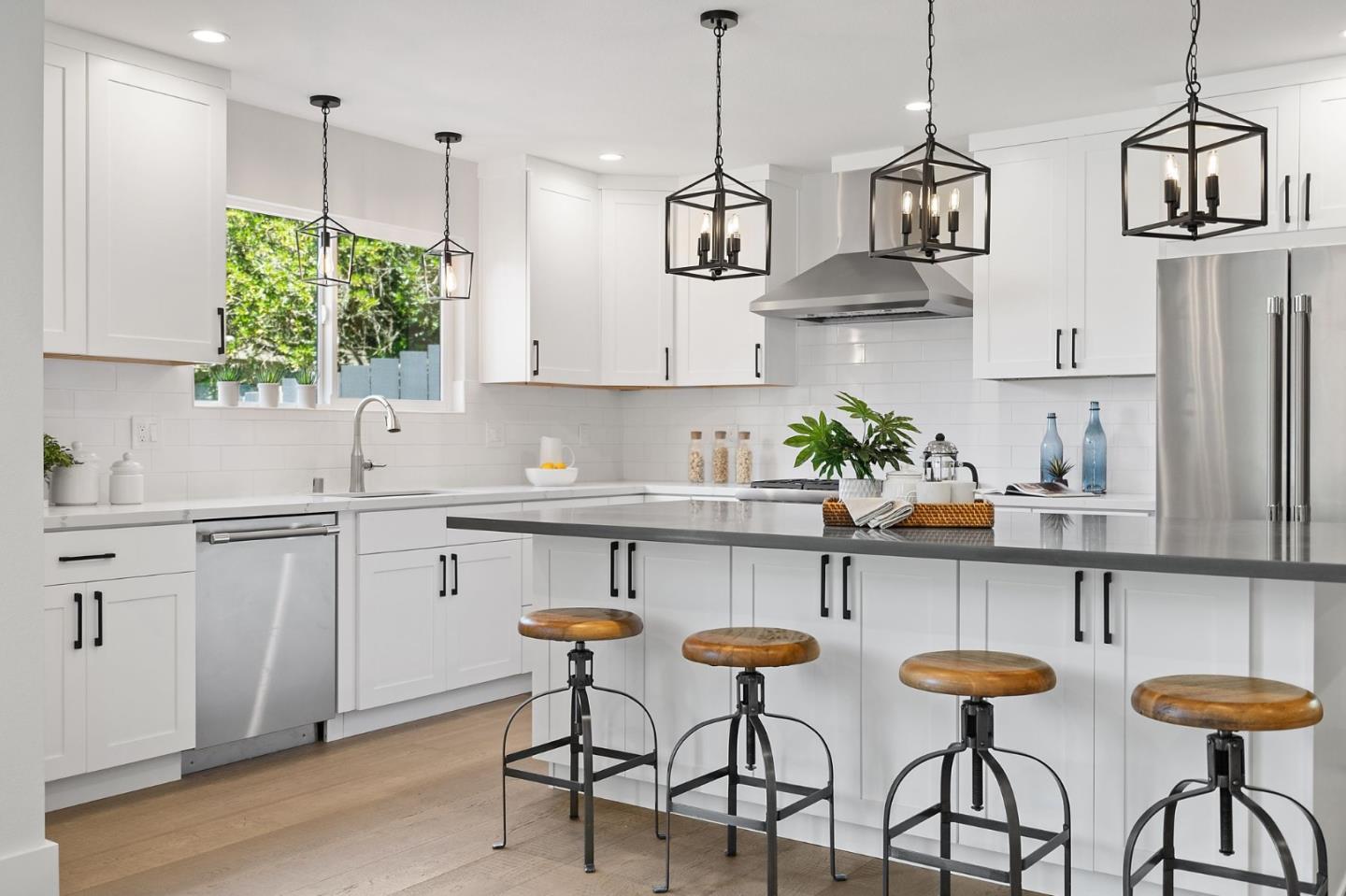 311 Keith Avenue Pacifica, CA 94044 - Photo 15 of 40 a kitchen with stainless steel appliances granite countertop a stove a sink and a refrigerator