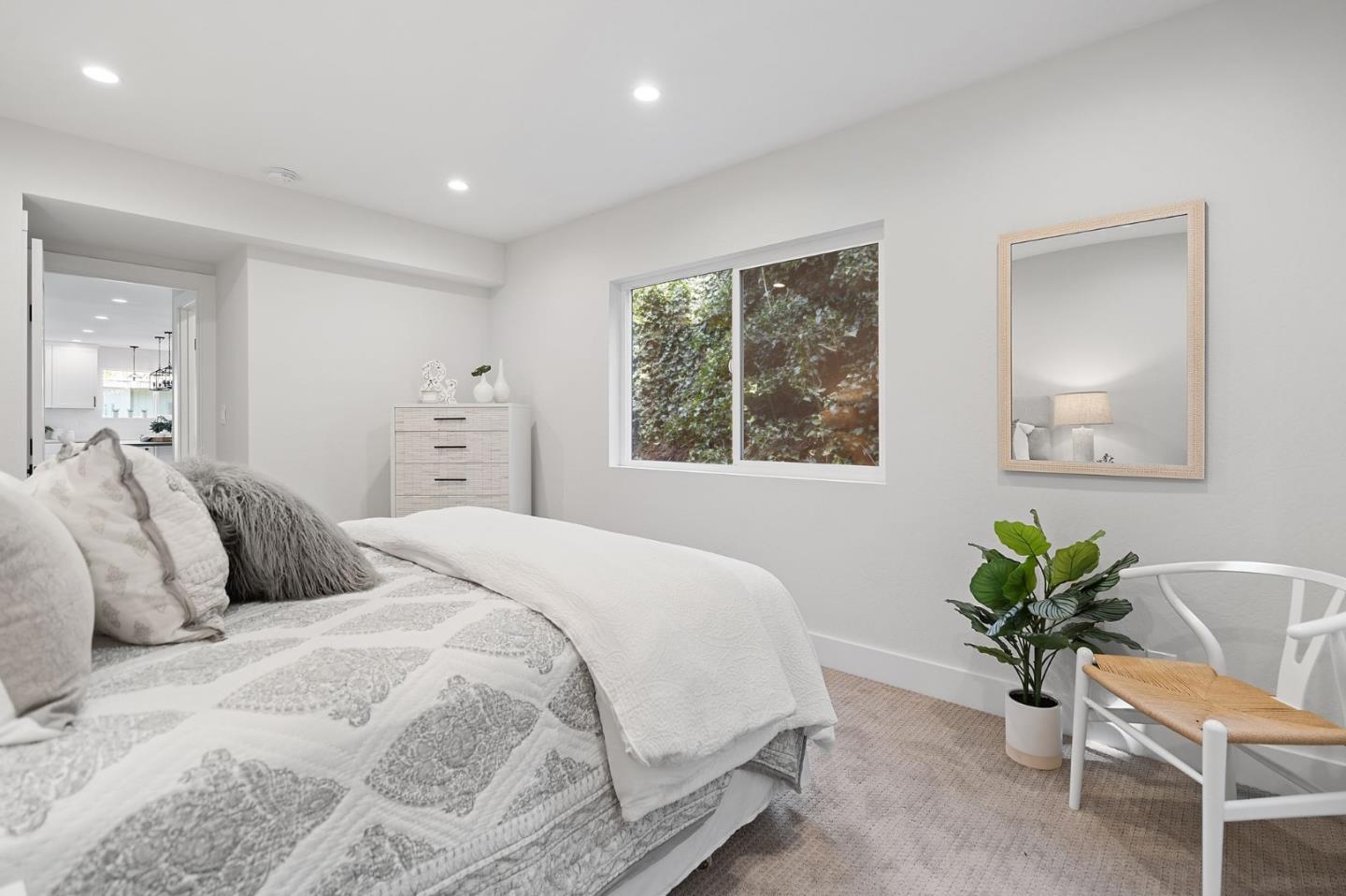 311 Keith Avenue Pacifica, CA 94044 - Photo 18 of 40 a bedroom with a bed and window