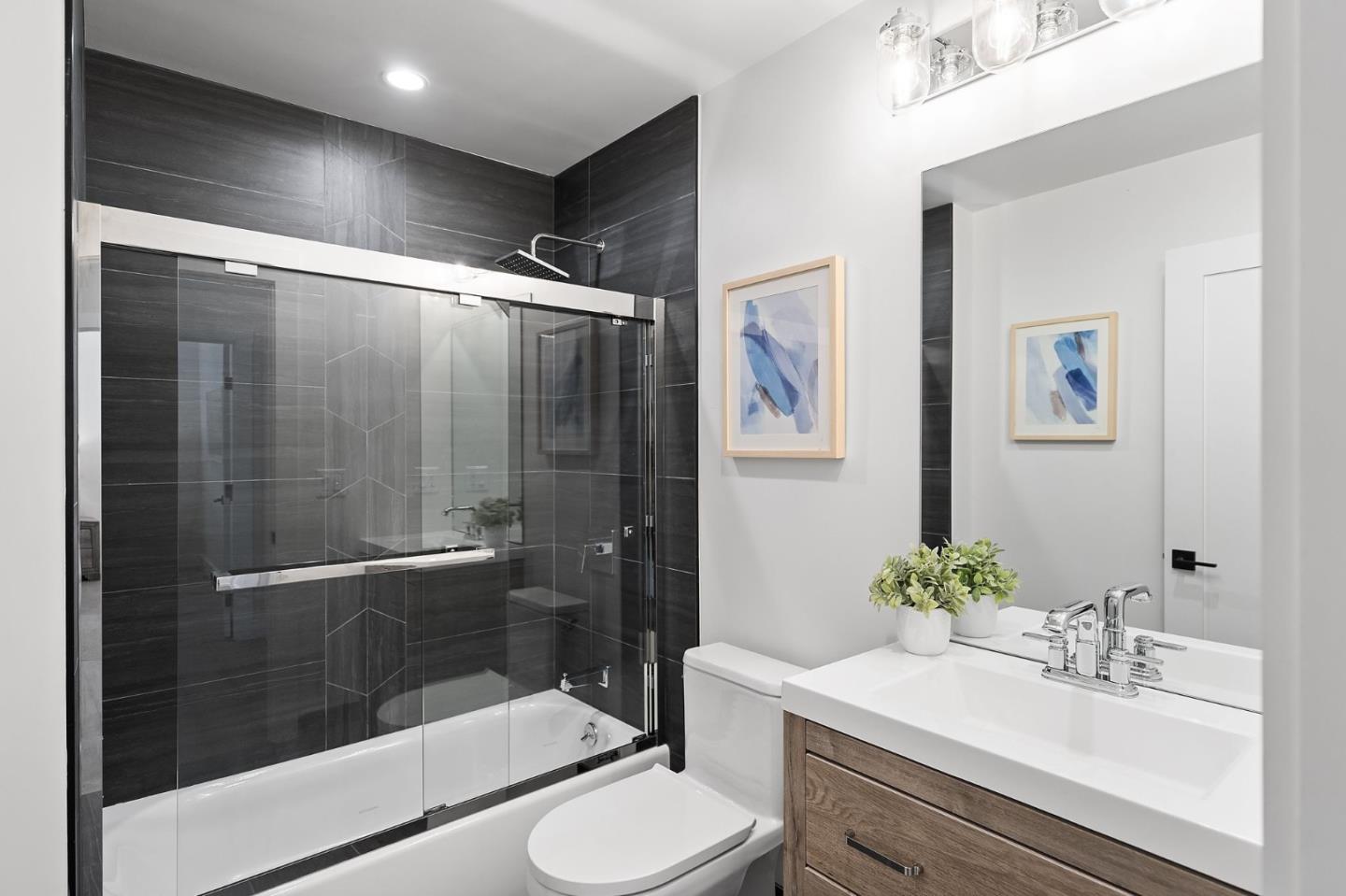 311 Keith Avenue Pacifica, CA 94044 - Photo 25 of 40 a bathroom with a sink toilet and shower