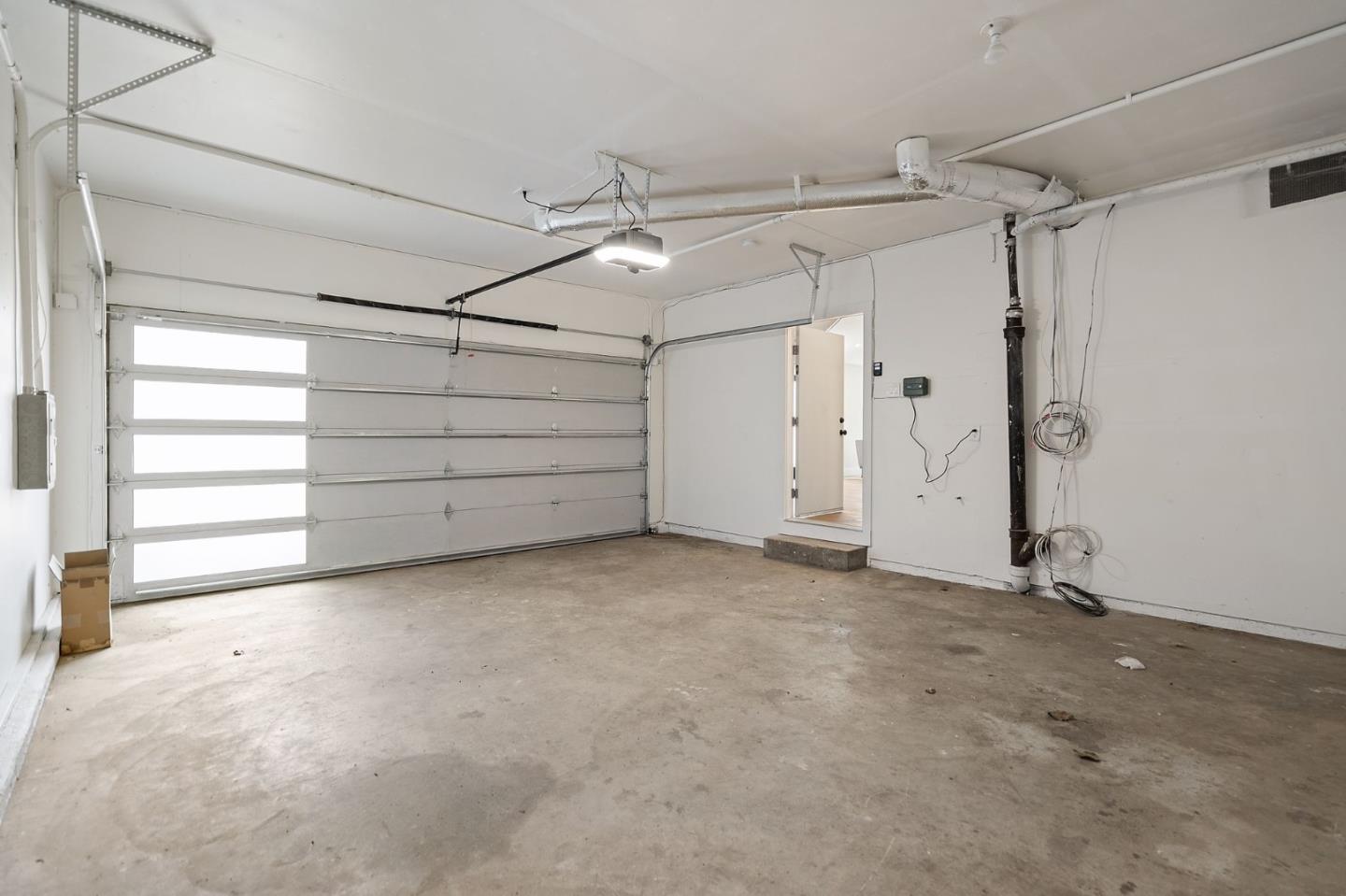 311 Keith Avenue Pacifica, CA 94044 - Photo 28 of 40 an empty room with a empty space and windows